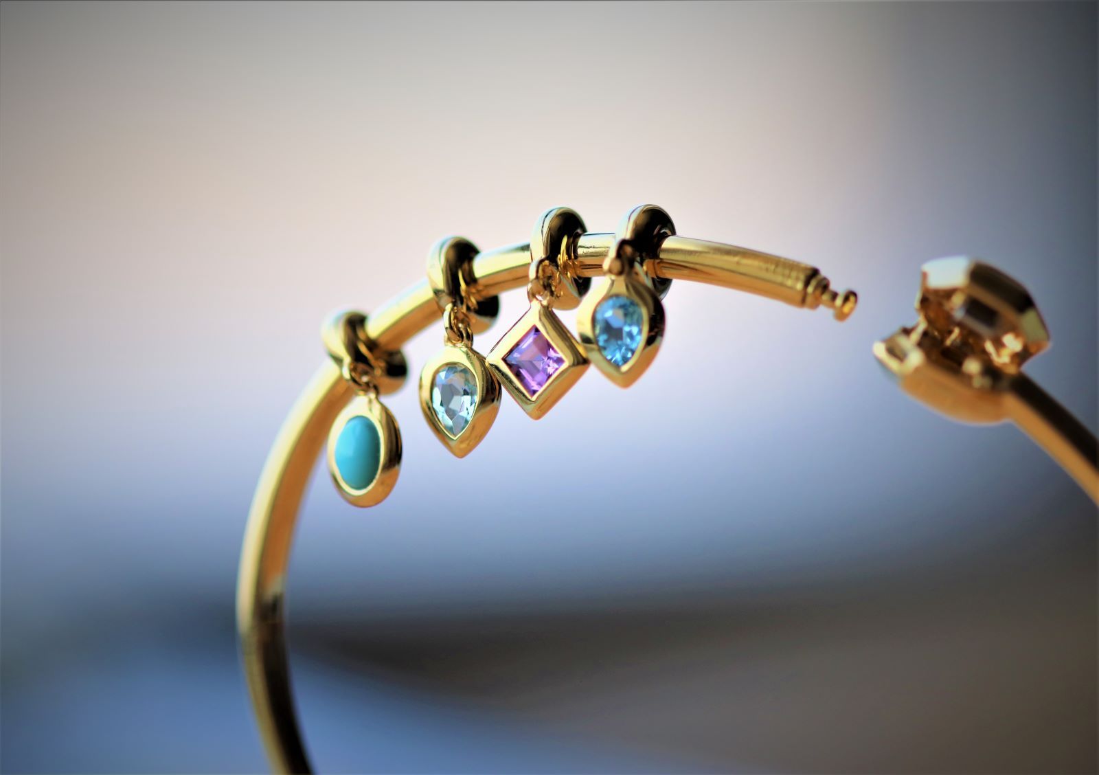 Achievement bracelet charms